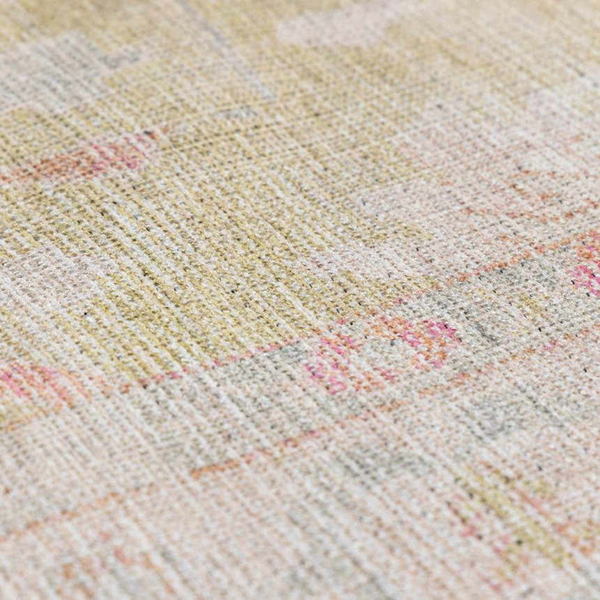 Close-up of the Bozkurt Boutique Washable Rug, showing its woven texture and cloud gray, lambswool, and pink tones. Texture
