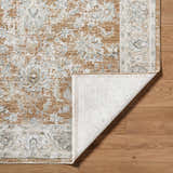 Close-up of the Kerem Damask Thick Luxe Boutique Rug showing its charcoal, cream, and light brown traditional pattern. Fold