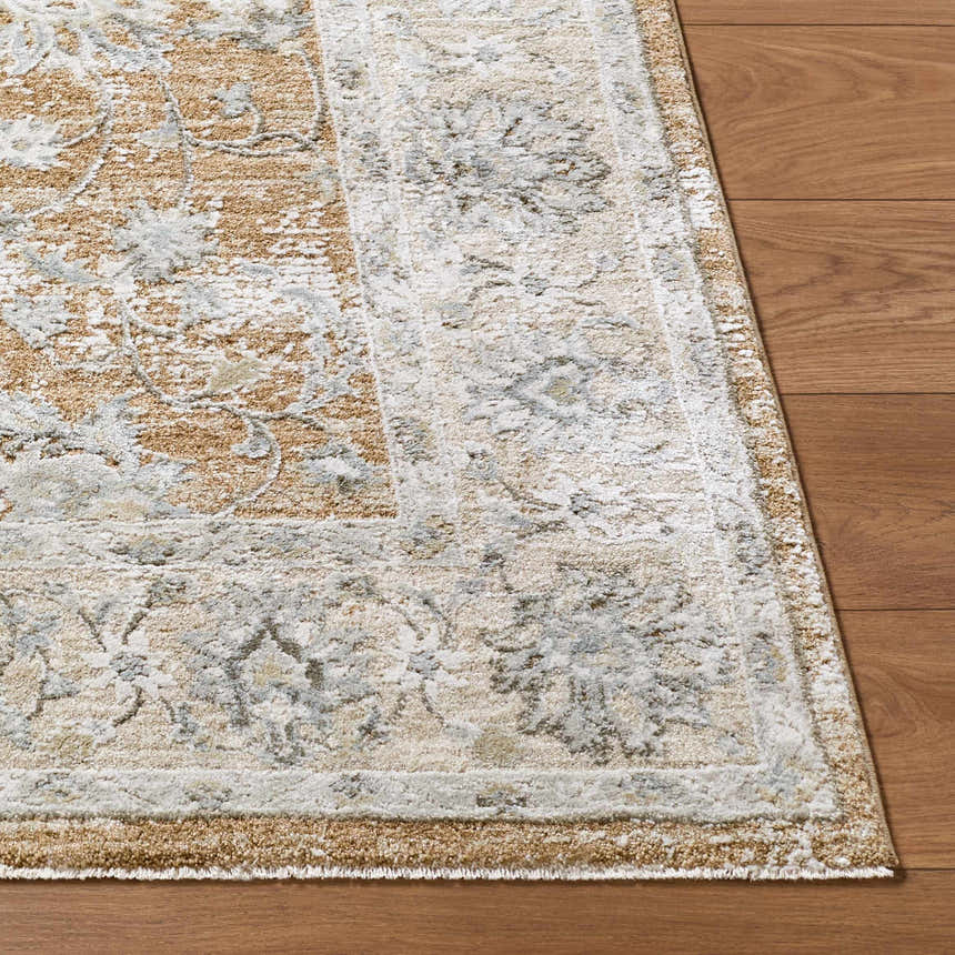 Close-up of the Kerem Damask Thick Luxe Boutique Rug showing its cream, light brown, and light gray traditional pattern. Front