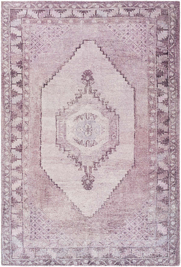 Close-up of the Wayde Area Rug. Hand-tufted polyester rug in dusty rose, lavender, and mauve with a traditional, farmhouse design. Design-Rectangle-576
