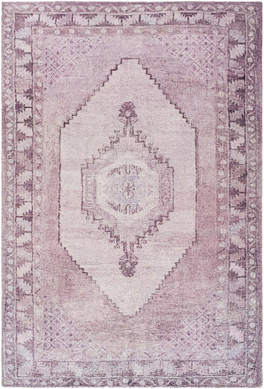 Close-up of the Wayde Area Rug. Hand-tufted polyester rug in dusty rose, lavender, and mauve with a traditional, farmhouse design. Design-Rectangle-576