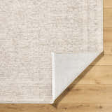 Close-up of Livabliss x Galey Alix Maria Elena V Vintage Medallion Area Rug in ivory, medium brown, and tan on wood floor. Fold