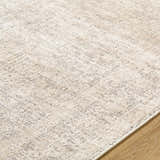Close-up of the Livabliss x Galey Alix Maria Elena V Vintage Medallion Area Rug, showing ivory, tan, and brown colors. Texture