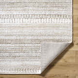 Close-up of the ash, light silver, and silver gray Akande Shag Area Rug showing the texture and machine woven construction. Fold