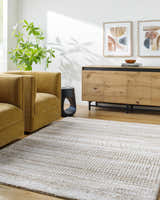 Living room scene with mustard chairs and light gray Akande Shag Area Rug. Farmhouse style. Roomscene-Rectangle