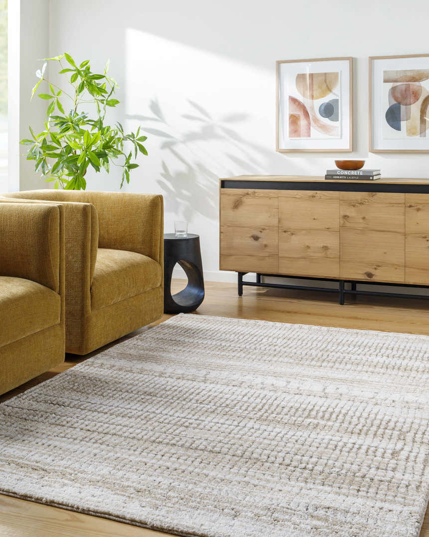 Living room scene with mustard chairs and light gray Akande Shag Area Rug. Farmhouse style. Roomscene-Rectangle