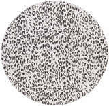 Close-up of round Alderbury White Leopard Print Rug. Black and charcoal spots on an off-white background. Design-Round-710