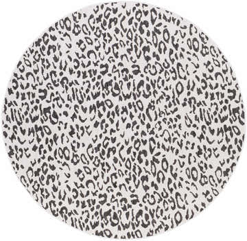 Close-up of round Alderbury White Leopard Print Rug. Black and charcoal spots on an off-white background. Design-Round-710