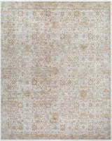 Close-up of the Andres Sage Area Rug. Traditional floral pattern in cream, tan, light brown, and blue. Machine woven polyester rug. Design-Rectangle-710102
