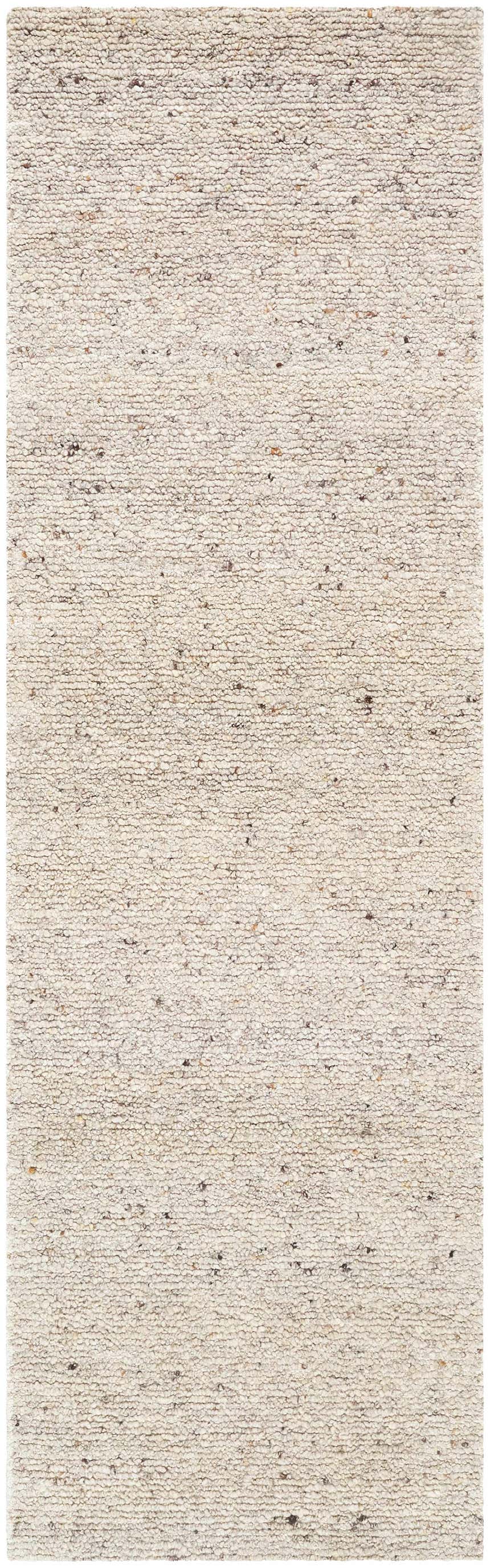 Close-up of the hand-tufted Winta Beige Wool Area Rug. Cream, ivory, and white tones with subtle texture. Design-Runner-310