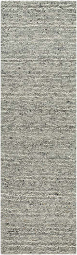Close-up of the hand-tufted Winta Charcoal Wool Area Rug. The rug has a textured, looped pile with ash, gray, and silver gray tones. Design-Runner-310