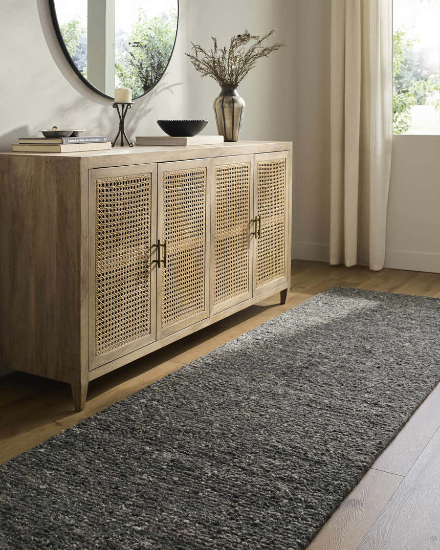 Entryway with a light wood cabinet and Winta Black Wool Area Rug runner on hardwood floors. Roomscene-Runner