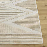 Close up of Annika Light Brown 3D Washable Area Rug with a beige geometric pattern and textured design. Front