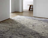 Contemporary living room with a Lowdham Premium Rug in black, cream, beige, gray, and taupe. Styleshot
