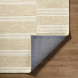 Close-up of the Argyro Area Rug showing beige, ivory, and sandstone stripes and hand-tufted wool texture. Fold