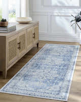 Farmhouse entryway with Lotan Blue Medallion Washable Area Rug runner, wood console table, and light hardwood floors. Roomscene-Runner