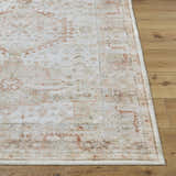 Close-up of Laran Rust Distressed Washable Area Rug showing traditional brick red and light gray pattern and soft texture. Front