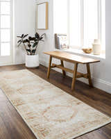 Entryway with Laran Rust Distressed Washable Area Rug runner, wood bench, plant, and wood floors. Farmhouse style. Roomscene-Runner