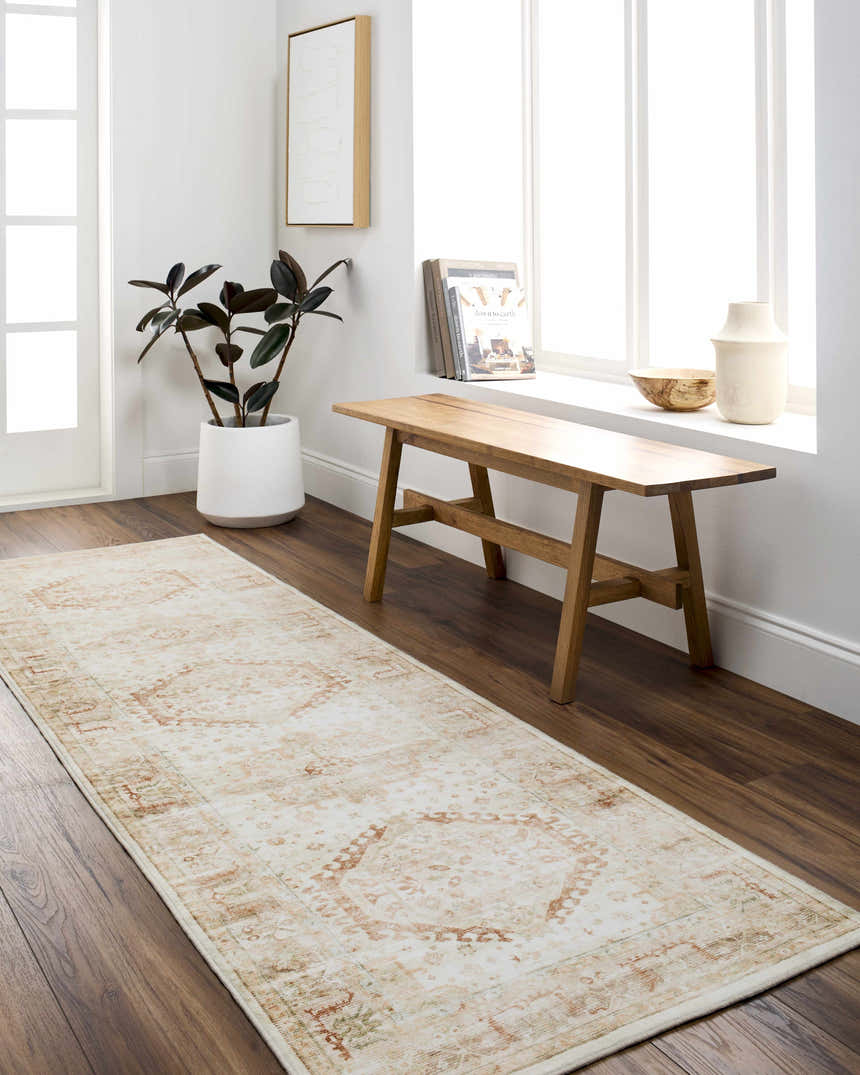 Entryway with Laran Rust Distressed Washable Area Rug runner, wood bench, plant, and wood floors. Farmhouse style. Roomscene-Runner
