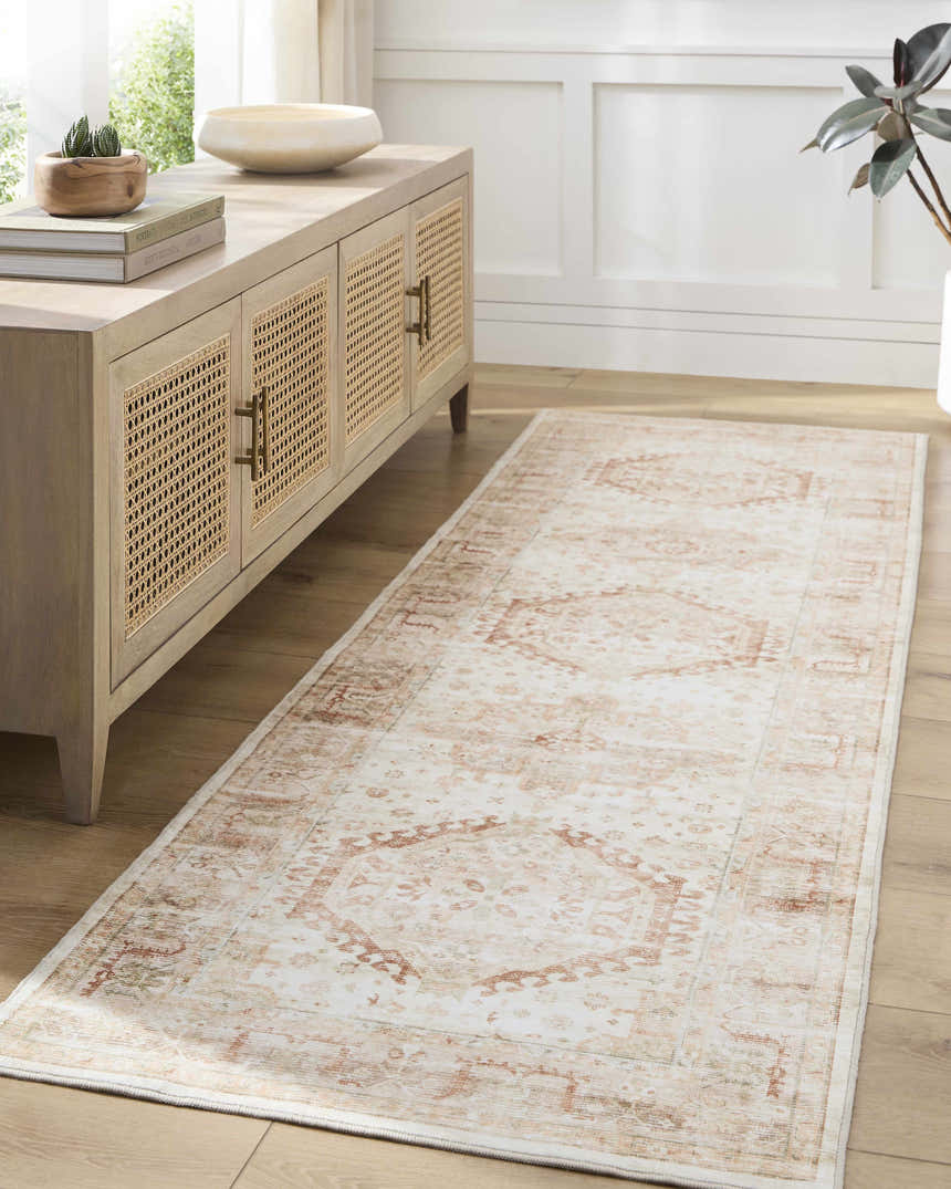 Hallway scene with Laran Rust Distressed Washable Area Rug runner, light wood floors, and a console table with woven details. Roomscene-Rectangle