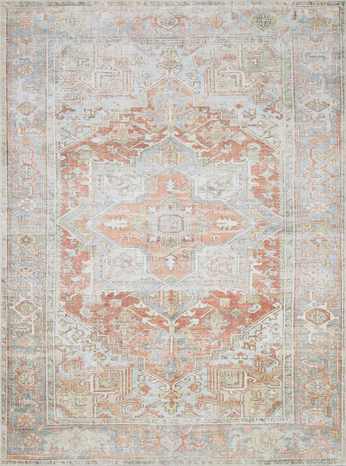 Close-up of the Rust Maayon Washable Rug featuring a traditional design in brick red, brown, blue, and sage. Design-Rectangle