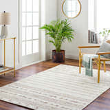 Living room scene with a cream and taupe striped Matawan Premium Wool Rug. Roomscene-Rectangle