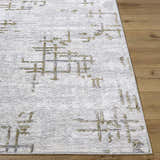 Close-up of Auriel Gray Area Rug. Contemporary design with charcoal, cream, and olive geometric pattern and soft texture. Front