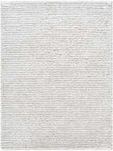 Close-up of the plush, cream Alysha Area Rug. Shag rug texture with subtle light slate tones. Design-Rectangle-537