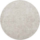 Close-up of a round Monto Luxe Rug in cream and gray with a subtle, traditional floral pattern. Design-Round-67
