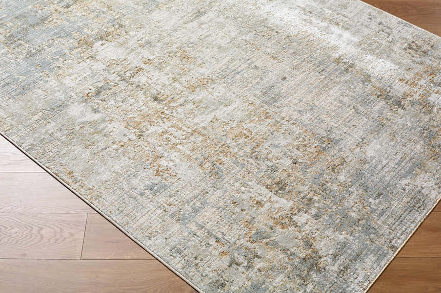 Close-up of the Marli Thick Luxe Area Rug showing its charcoal, cream, brown, and gray traditional pattern. Corner