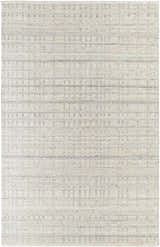 Close-up of the hand woven Nissa Tan Area Rug. Ivory and tan wool rug with a subtle geometric pattern. Design-Rectangle-576