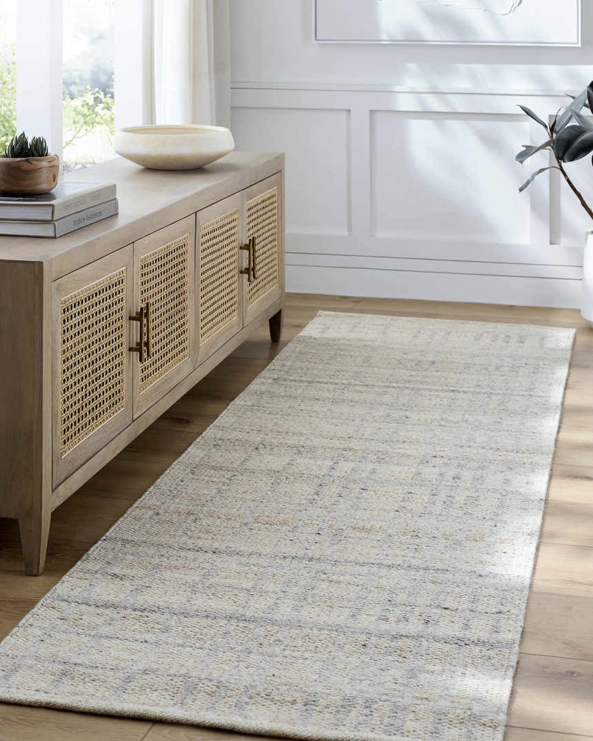 Living room scene with tan wood cabinet and ivory Nissa Tan runner rug. Roomscene-Runner