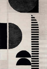 Close-up of the Brooklyn Modern rug. Hand-tufted wool rug with black geometric shapes on a cream and beige background. Design-Rectangle