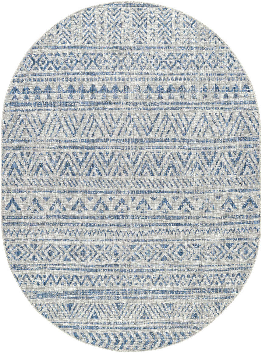 Close-up of the Novato All Over Pattern Performance Rug, round shape, with a blue geometric design on a light background. Design-Oval-5373