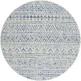 Close-up of the round Novato All Over Pattern Performance Rug. Features a blue geometric design on a textured light background. Design-Round-53