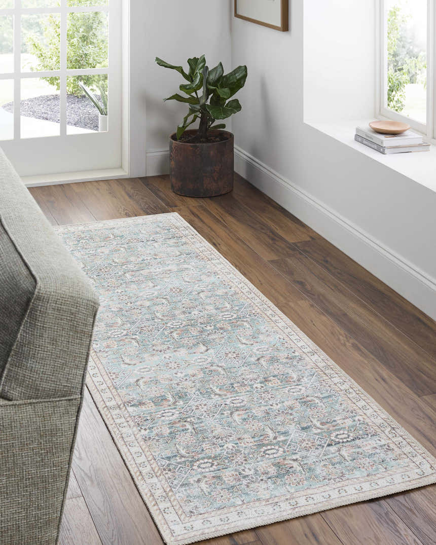 Entryway with Ayanna Washable Area Rug. Runner rug in cream, teal, and red with traditional pattern on wood floor. Roomscene-Runner