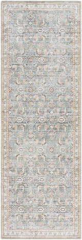Close-up of the Ayanna Washable Area Rug. Features a traditional design in cream, teal, tan, and dark red hues. Machine woven polyester. Design-Runner-27710