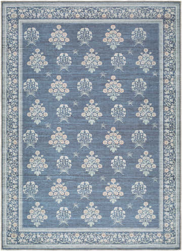 Close-up of the Aquene Denim Washable Area Rug. Features a denim blue background with ivory, sage, and soft peach floral pattern. Design-Rectangle-537