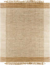 Close-up of the Outaouais Jute Rug. Hand-woven rug in light brown, natural jute, and tan with fringe. Contemporary farmhouse style. Design-Rectangle-810