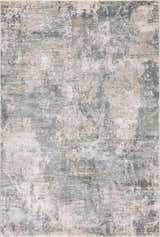 Close-up of the Pialba Thick Luxe Abstract Smokey Rug. Features a distressed design in dusty sage, light blue, and taupe. Design-Rectangle
