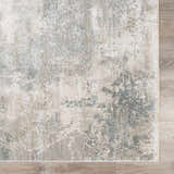Close-up of the Pialba Thick Luxe Abstract Smokey Rug, showcasing its dusty sage, light blue, and gray abstract design. Swatch