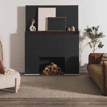 Living room scene with a Lucerne Ivory wool rug, black fireplace, and brown sofa. Roomscene-Rectangle