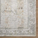 Close-up of Pryce Sage Thick Luxe Area Rug showing traditional design, charcoal, cream, brown, and gray colors. Corner