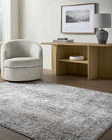 Living room scene with a neutral swivel chair and Avital Neutral Abstract Area Rug. Roomscene-Rectangle