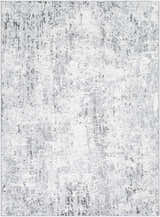 Close-up of the Avital Area Rug featuring a contemporary abstract design in shades of gray, charcoal, and white. Design-Rectangle-537