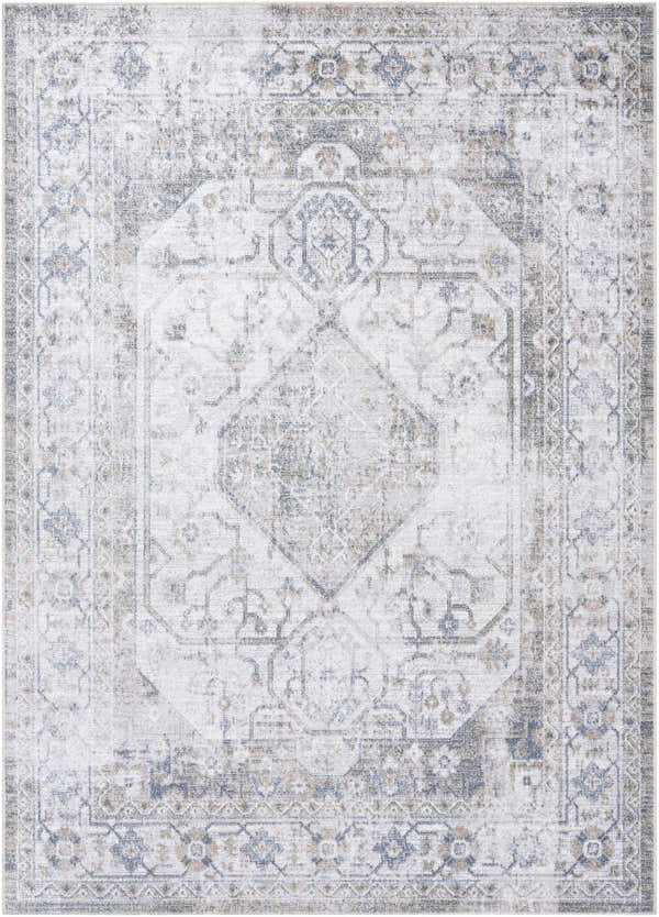 Close-up of the Annlea Washable Area Rug. Farmhouse style rug in blue, sage, and white with a traditional, distressed pattern. Design-Rectangle-537