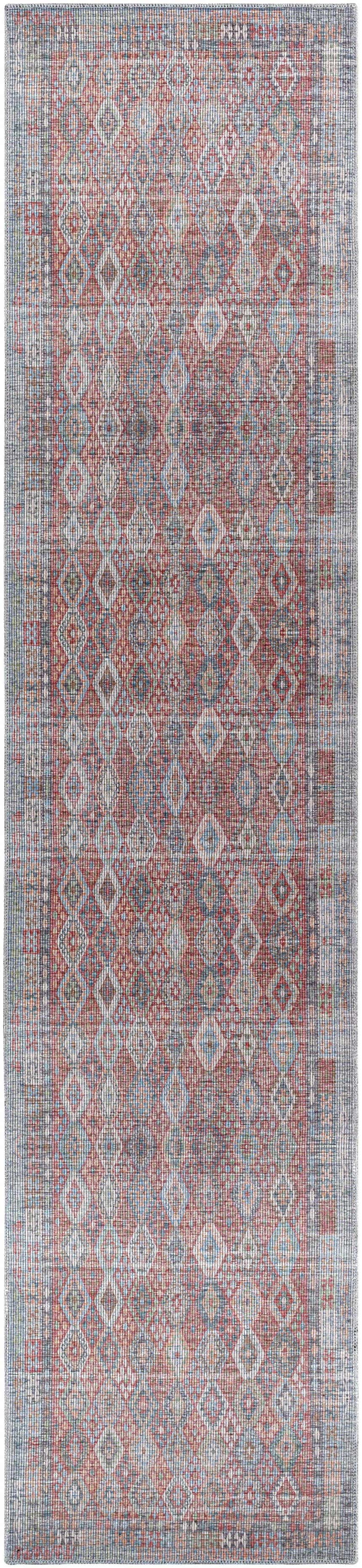 Close-up of the Ranao Washable Area Rug, featuring a vintage diamond pattern in blue, red, and taupe hues. Design-Runner-2712