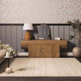 Living room scene with a Capote Ivory Area Rug, wood console table, and floral wallpaper. Roomscene-Rectangle