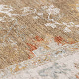 Close-up of the Rangeville Thick Luxe Statement Rug showing its brown, orange, and cream traditional pattern. Texture