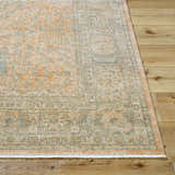 Close-up of Becki Owens x Livabliss Renaissance BORI-2301 runner rug. Beige, coral, and denim traditional pattern. Front